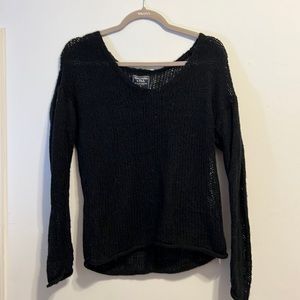 A black sheer sweater